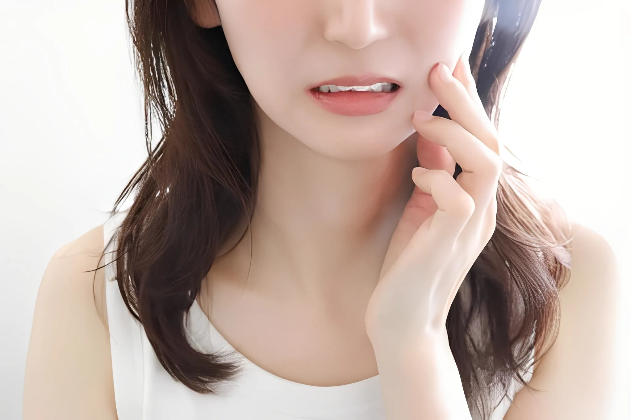 顎関節症の女性